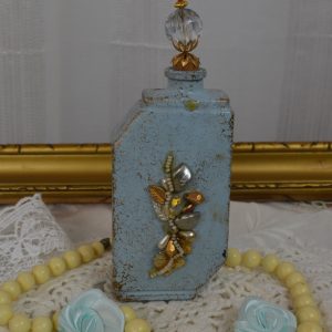 Flacon de parfum relooké de La maison de Carine