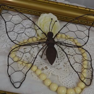 Papillon grillagé de La maison de Carine