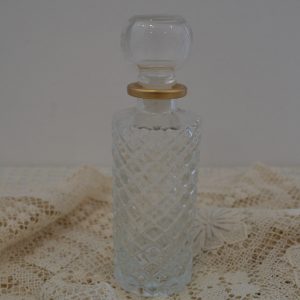 Flacon de parfum vide en verre de La maison de Carine