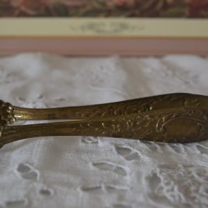 Pince à sucre pattes de lion en métal doré de La maison de Carine